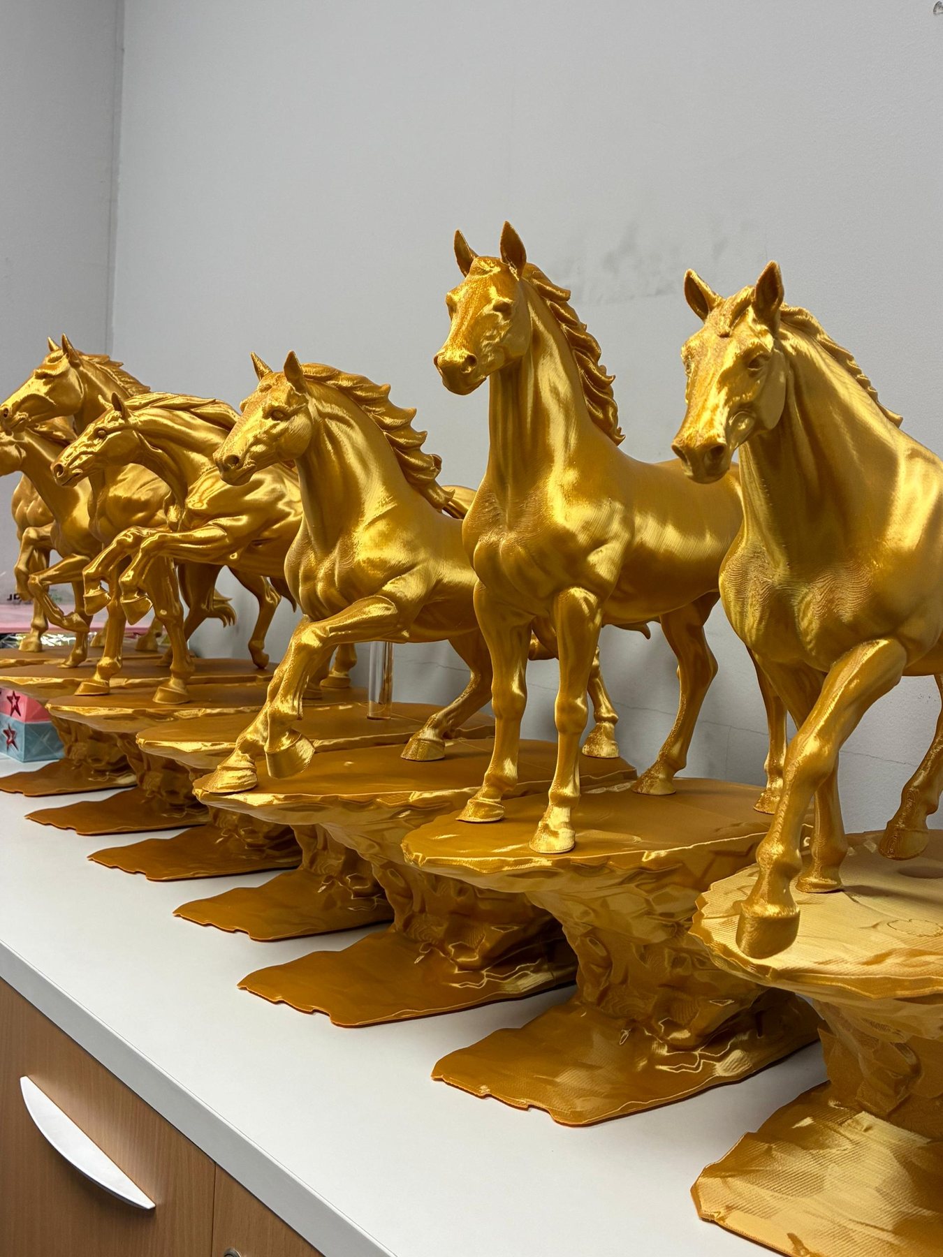 Gold finished horse sculptures